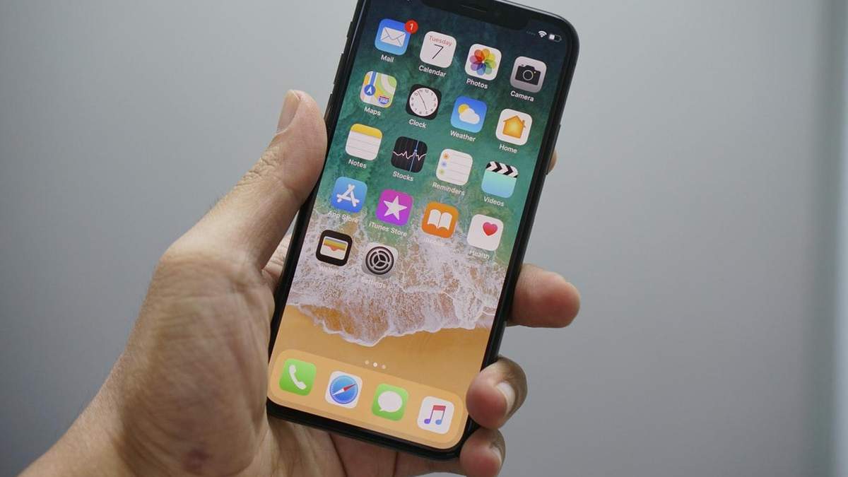 Apple может повернуть сканер отпечатков пальцев Apple может повернуть сканер отпечатков пальцев