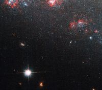 Телескоп "Габбл" зазирнув у таємниче "вушко голки" карликової спіральної галактики